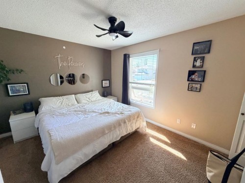 11 Lakhota Crescent West, Lethbridge, AB - Indoor Photo Showing Bedroom