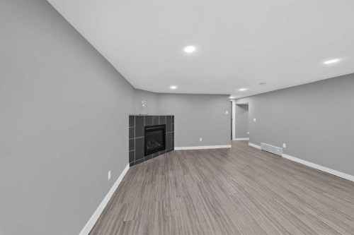 2110 15 Avenue South, Lethbridge, AB - Indoor With Fireplace