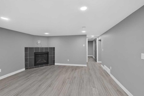 2110 15 Avenue South, Lethbridge, AB - Indoor With Fireplace