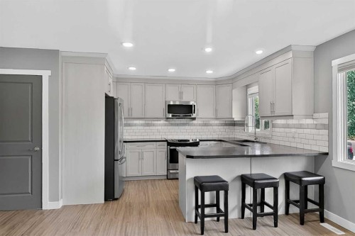 2110 15 Avenue South, Lethbridge, AB - Indoor Photo Showing Kitchen With Upgraded Kitchen