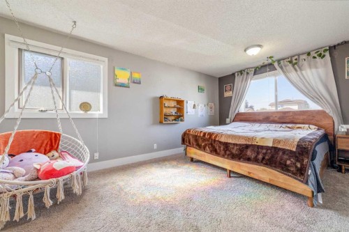 3921 Harmony Place, Taber, AB - Indoor Photo Showing Bedroom