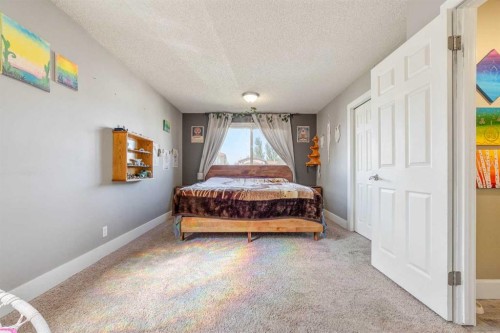 3921 Harmony Place, Taber, AB - Indoor Photo Showing Bedroom