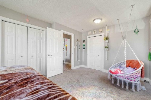 3921 Harmony Place, Taber, AB - Indoor Photo Showing Bedroom