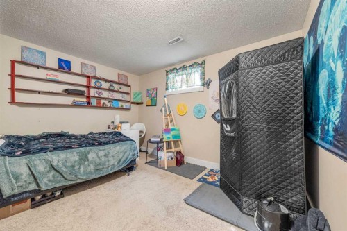 3921 Harmony Place, Taber, AB - Indoor Photo Showing Bedroom
