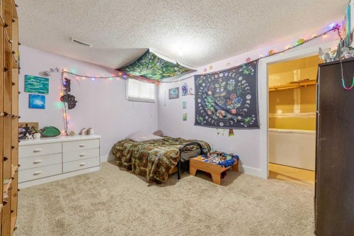 3921 Harmony Place, Taber, AB - Indoor Photo Showing Bedroom