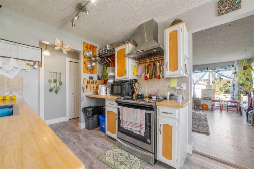 3921 Harmony Place, Taber, AB - Indoor Photo Showing Kitchen