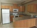 #201-9810 94 Street, Peace River, AB  - Indoor Photo Showing Kitchen 