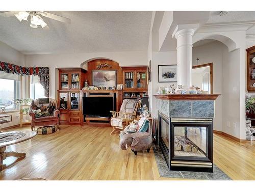 712071 Range Road 64, Grande Prairie, AB - Indoor Photo Showing Living Room With Fireplace