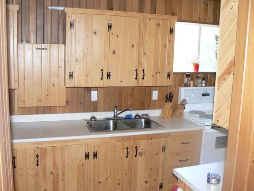 #8 4 Avenue, High Prairie, AB - Indoor Photo Showing Kitchen With Double Sink