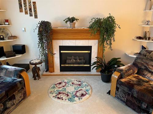 11804 102 Avenue, Fairview, AB - Indoor Photo Showing Living Room With Fireplace