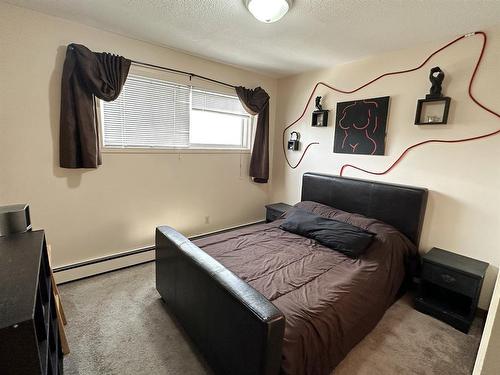 --10204 106 Avenue, Grande Prairie, AB - Indoor Photo Showing Bedroom