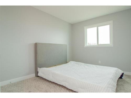 7822 91 Street East, Grande Prairie, AB - Indoor Photo Showing Bedroom