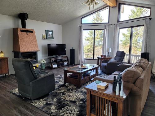 310 Brassard Lane, Mclennan, AB - Indoor Photo Showing Living Room With Fireplace