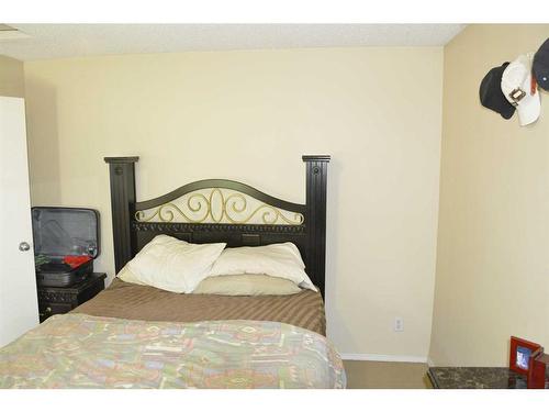 4-8205 98 Street, Peace River, AB - Indoor Photo Showing Bedroom