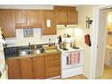 4-8205 98 Street, Peace River, AB  - Indoor Photo Showing Kitchen With Double Sink 