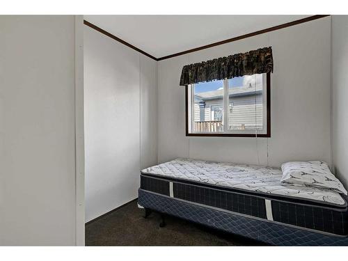 11206 96 Street, Clairmont, AB - Indoor Photo Showing Bedroom
