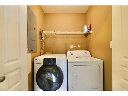 9130 128 Avenue, Peace River, AB - Indoor Photo Showing Laundry Room