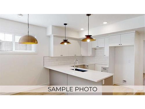 221-11850 84 Avenue, Grande Prairie, AB - Indoor Photo Showing Kitchen