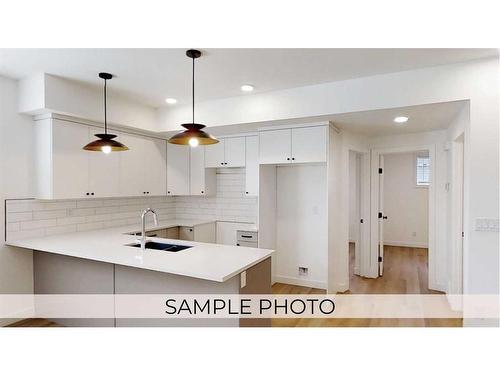 221-11850 84 Avenue, Grande Prairie, AB - Indoor Photo Showing Kitchen With Double Sink