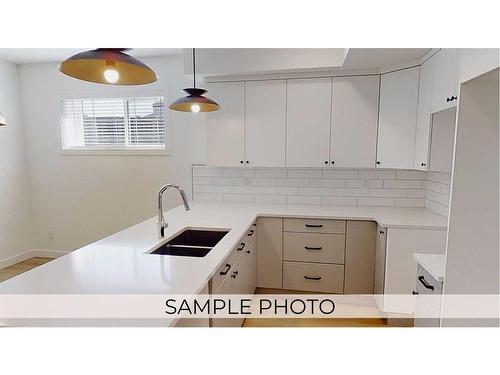 221-11850 84 Avenue, Grande Prairie, AB - Indoor Photo Showing Kitchen With Double Sink