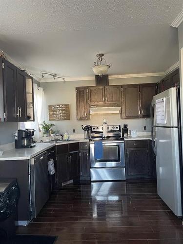 5613 Evergreen Drvie, High Prairie, AB - Indoor Photo Showing Kitchen With Double Sink