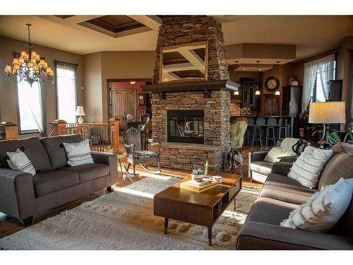 13 Chinook Crescent, High Level, AB - Indoor Photo Showing Living Room With Fireplace