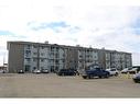 12015 Royal Oaks Drive, Grande Prairie, AB  - Outdoor With Balcony With Facade 