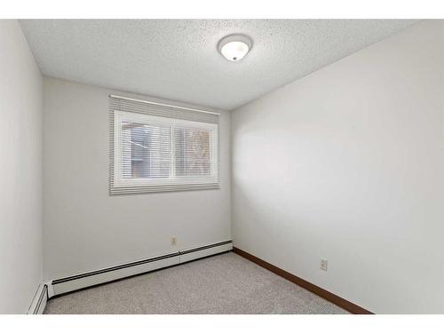 210-9738 82 Avenue, Grande Prairie, AB - Indoor Photo Showing Other Room