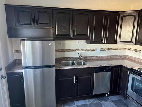 4808 54 Avenue, Grimshaw, AB - Indoor Photo Showing Kitchen With Double Sink