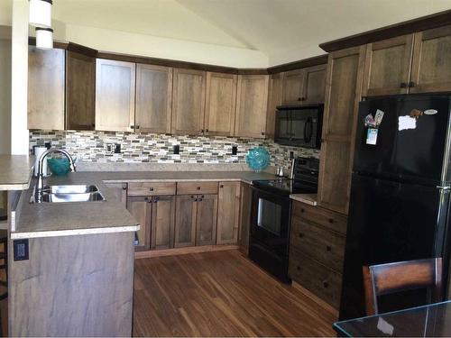 10410 90 Street, Peace River, AB - Indoor Photo Showing Kitchen With Double Sink