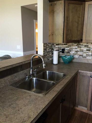 10410 90 Street, Peace River, AB - Indoor Photo Showing Kitchen With Double Sink