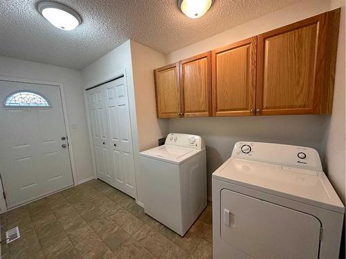 4904 50 Street, Grimshaw, AB - Indoor Photo Showing Laundry Room