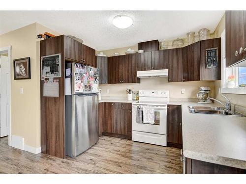 10109 92A Street, Grande Prairie, AB - Indoor Photo Showing Kitchen With Double Sink