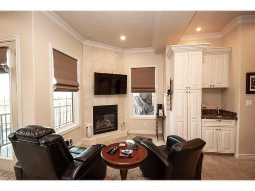 2-714040 Range Road 71, Grande Prairie, AB - Indoor Photo Showing Living Room With Fireplace