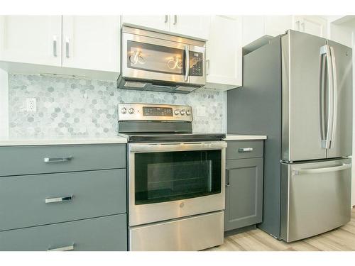8845 85A Avenue, Grande Prairie, AB - Indoor Photo Showing Kitchen