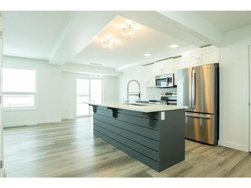 8845 85A Avenue, Grande Prairie, AB - Indoor Photo Showing Kitchen With Upgraded Kitchen