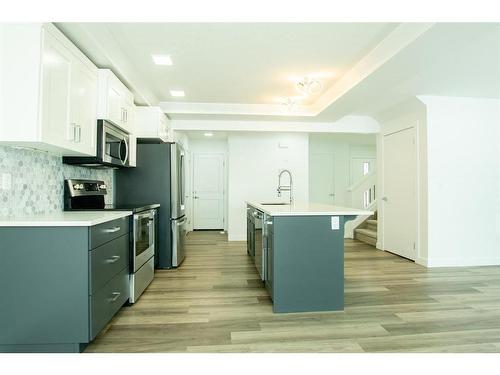 8845 85A Avenue, Grande Prairie, AB - Indoor Photo Showing Kitchen