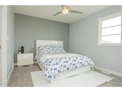 7906 91 Street, Grande Prairie, AB - Indoor Photo Showing Bedroom