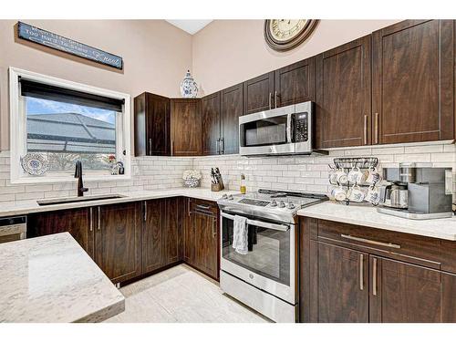 9301 61 Avenue, Grande Prairie, AB - Indoor Photo Showing Kitchen With Upgraded Kitchen