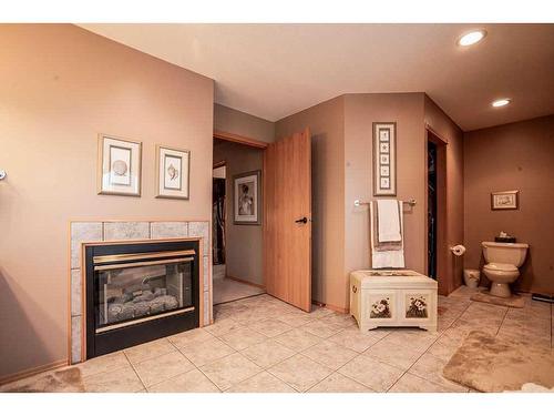 503 5Th Street Ne, Manning, AB - Indoor With Fireplace