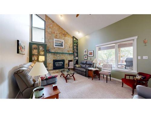 6102 96B Street, Grande Prairie, AB - Indoor Photo Showing Living Room With Fireplace