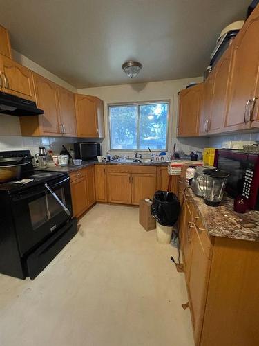 5521 47Th Street, High Prairie, AB - Indoor Photo Showing Kitchen With Double Sink