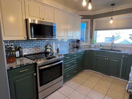 4 Blackspruce Drive, High Level, AB - Indoor Photo Showing Kitchen With Upgraded Kitchen