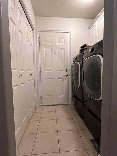 4 Blackspruce Drive, High Level, AB - Indoor Photo Showing Laundry Room