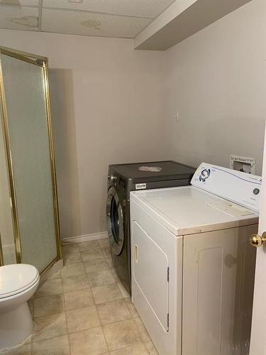 9713 106 Avenue, Clairmont, AB - Indoor Photo Showing Laundry Room