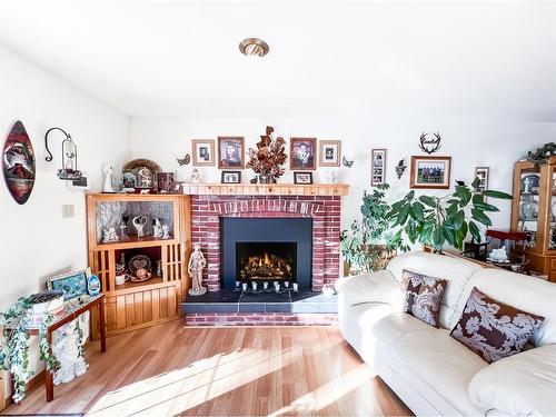 4816 3 Street, Donnelly, AB - Indoor Photo Showing Living Room With Fireplace