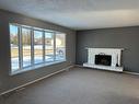 9415 84 Avenue, Peace River, AB  - Indoor With Fireplace 