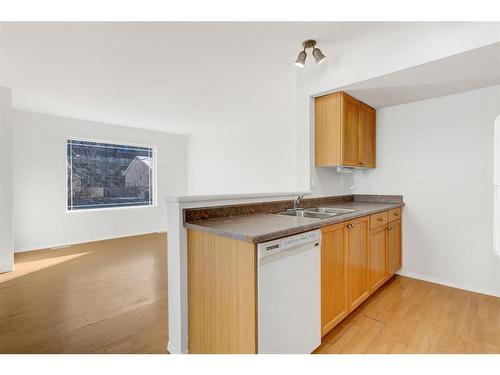 12914 93 Street, Grande Prairie, AB - Indoor Photo Showing Kitchen With Double Sink