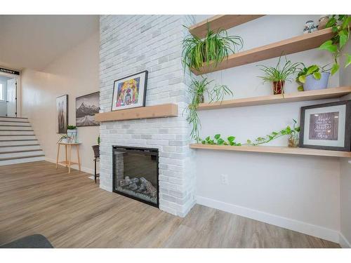 8129 121 Street, Grande Prairie, AB - Indoor With Fireplace