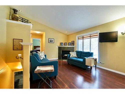 15, 843058 Range Road 222, Rural Northern Lights, County Of, AB - Indoor Photo Showing Living Room With Fireplace